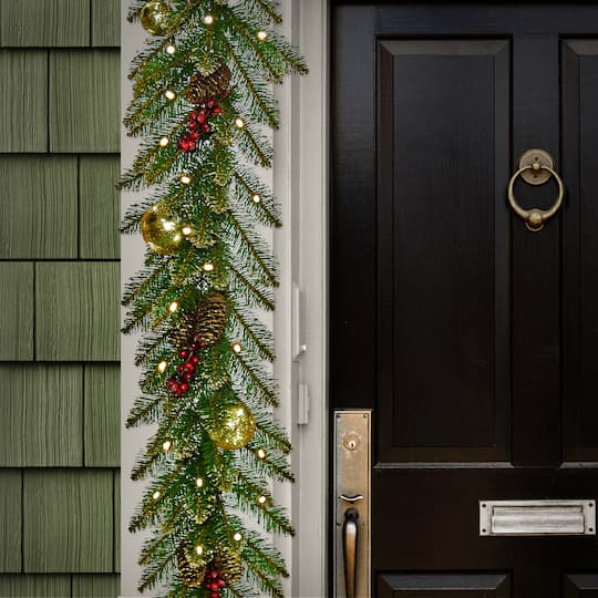 9'x 10" Pre-lit Glittery Gold Dunhill® Fir Artificial Christmas Garland w/ Red Berries, Gold Edged Cones, Gold Ornaments & Warm White Battery Operated LED Lights w/Timer